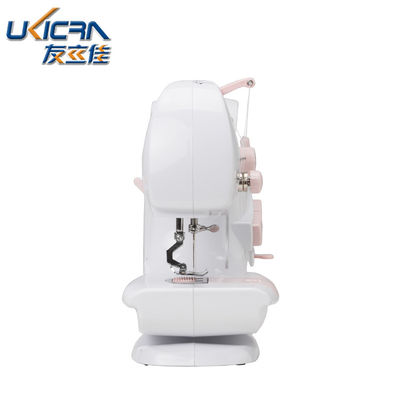 Mini machine à coudre UFR-601 pour le ménage avec une longueur de couture de 0 à 5 mm en blanc et rose